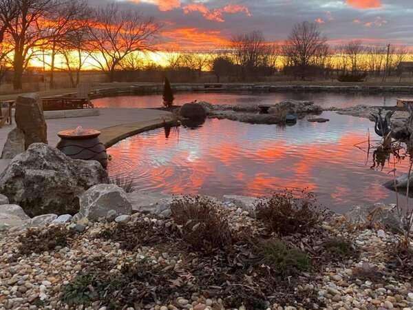 Natural swim pond during sunset