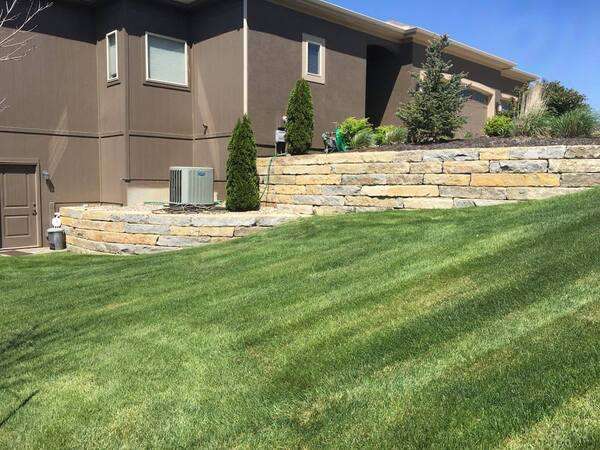 stone retaining wall built by Freedom Stone + Pondscapes