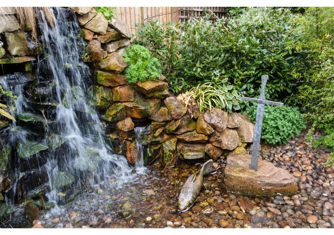 Tall waterfall over rocks