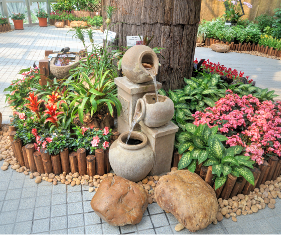 a garden filled with lots of different types of flowers.